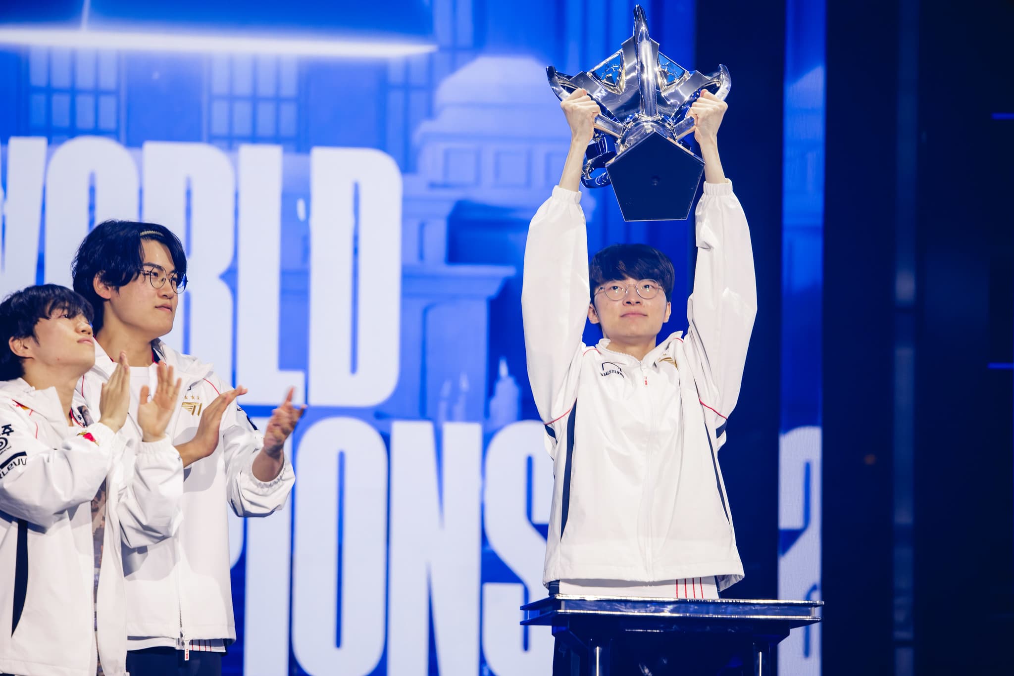 Faker and T1 lift thier fifth trophy (Photo by Colin Young-Wolff/Riot Games)