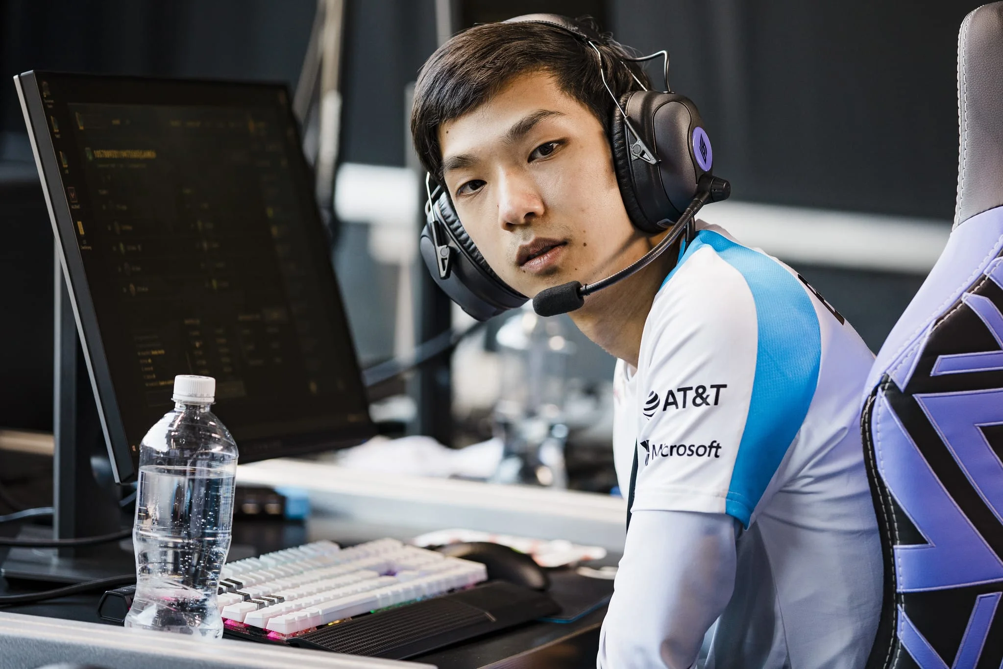 Blaber playing on stage as jungler for Cloud9, wearing headset and team jersey during a League of Legends match
